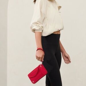 Athleta Coffee Run Clutch in Clove Berry